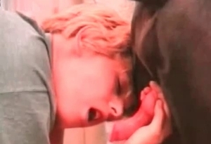 A whore with a short hair having fun with a dog dick